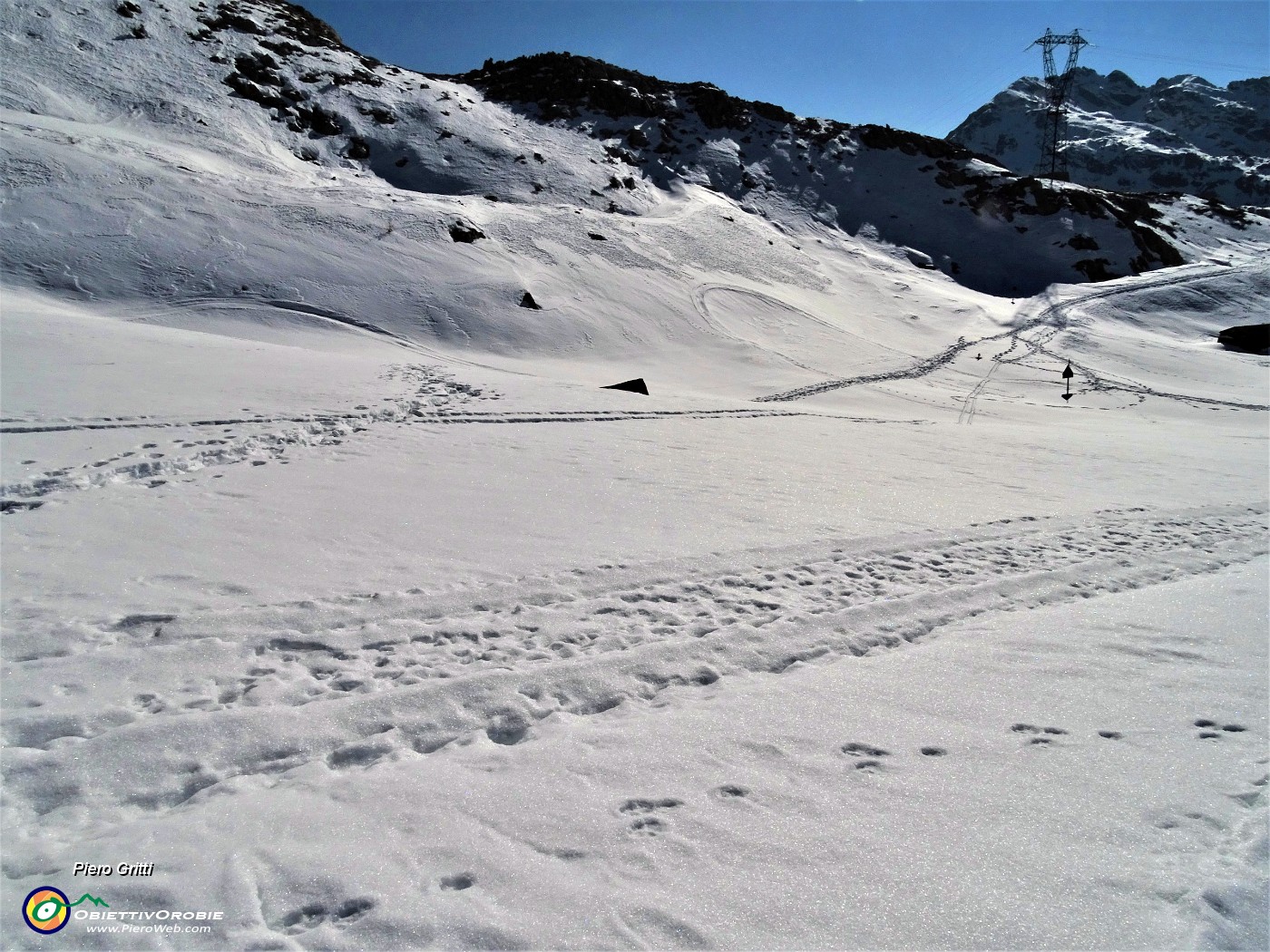 55 Rientro al Passo San Marco con affondi nella neve rammollita dal sole.JPG -                                